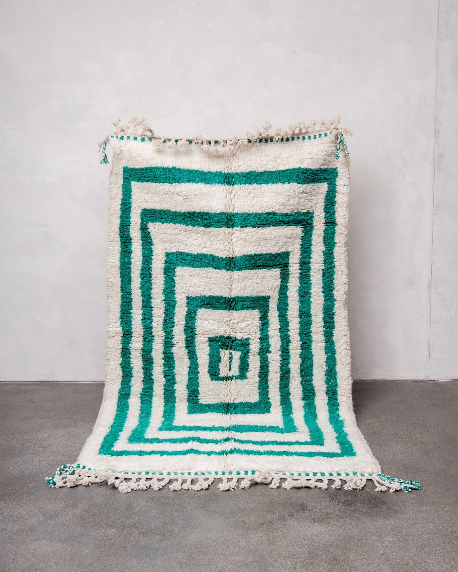 Modern, designer, handcrafted Berber rug from Morocco. Beniourain carpet with beautiful colours and patterns and fluffy wool texture.